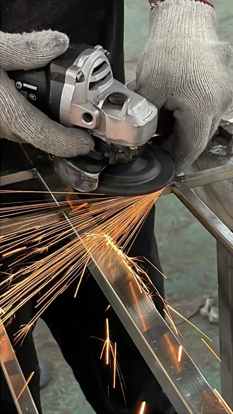 Grinding a stainless steel frame
